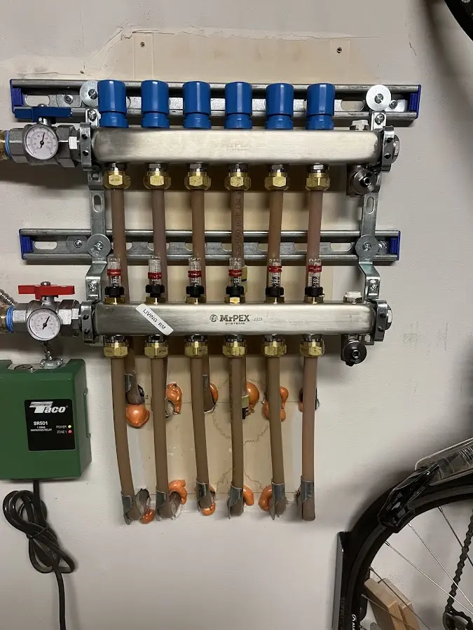 Plumber performing Gas Line Installation at a residential property in New Hampton